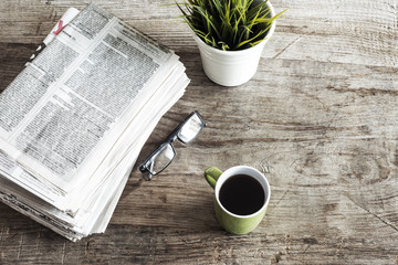 Newspaper on wooden table