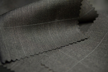 close up texture brown with white line fabric of suit