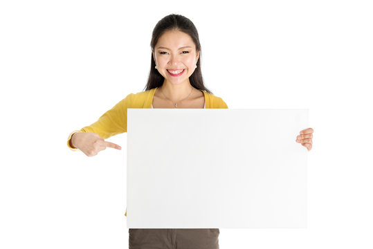 Young Asian woman holding white paper card