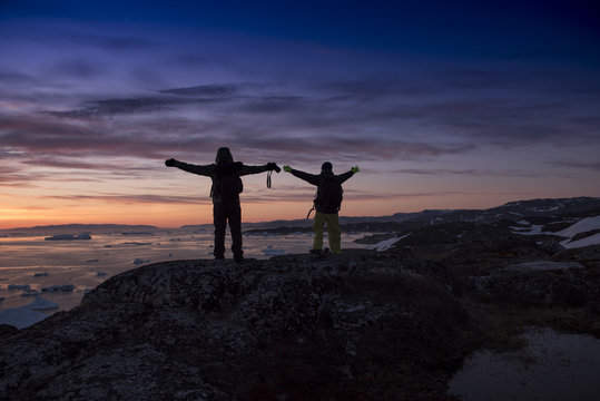 People Silhouette With Sunset In Greenland