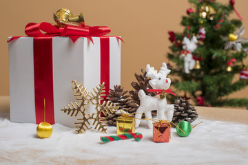 Fototapeta na wymiar Christmas gift box and christmas decoration