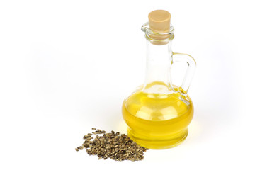 Thistle oil is poured into the bottle