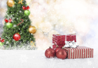 Christmas balls with gift box and snowflake on christmas tree background.