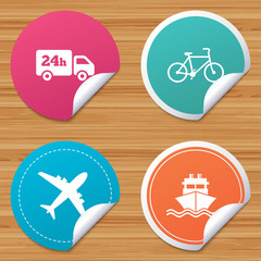 Round stickers or website banners. Cargo truck and shipping icons. Shipping and eco bicycle delivery signs. Transport symbols. 24h service. Circle badges with bended corner. Vector