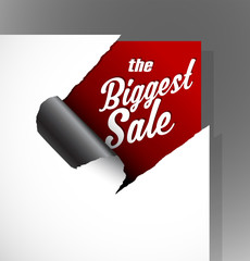 The Biggest Sale text uncovered from teared paper corner.