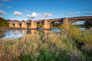 River Tyne under Corbridge Road Bridge, originally built in the thirteenth century, the bridge at Corbridge allows crossing of the River Tyne - Powered by Adobe