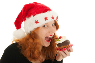 Christmas girl eating cake