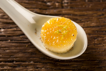 Tapioca pudding with tirage - spice native to the Amazon region in a spoon. Taste gastronomy fingerfood