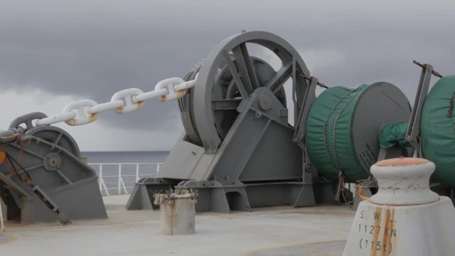 Anchor winch with chain and mooring winche of large ship