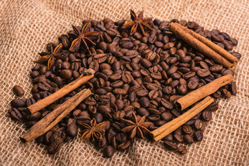 Coffee beans scattered on burlap