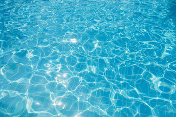 Naklejka na ściany i meble Ripple Water in swimming pool with sun reflection