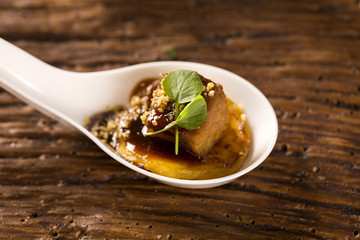 Pork tongue, ground banana, Marsala reduction, water meal and Mini watercress in a spoon. Taste gastronomy fingerfood