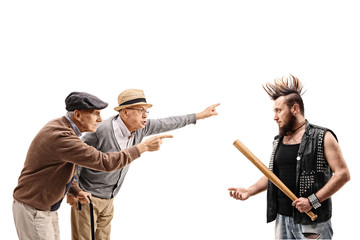 Two elderly men arguing with a punker
