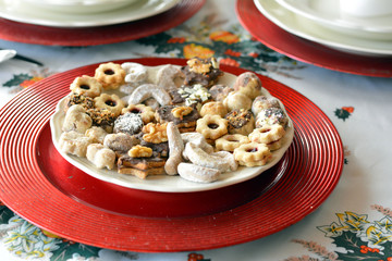 Lovely close up image of Christmas cookies on a plate on a table