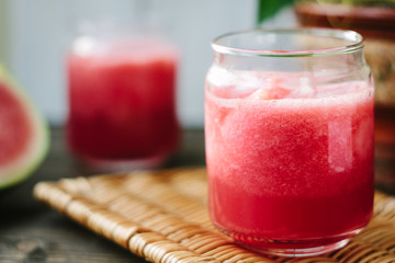 Watermelon smoothie in glasses with slices of watermelon