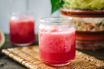 Watermelon smoothie in glasses with slices of watermelon