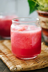 Watermelon smoothie in glasses with slices of watermelon
