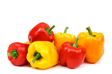 Fruits of sweet pepper on white background.
