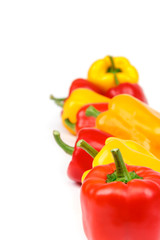 Fruits of sweet pepper on white background.