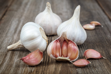 Fresh garlic on a wooden background