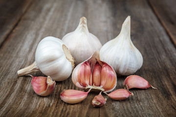 Fresh garlic on a wooden background