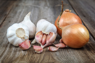 Fresh garlic on a wooden background