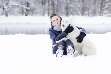 Girl and dog, winter walk