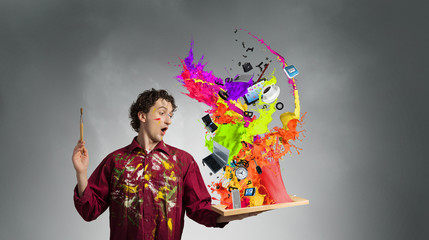 Guy painter waiting for inspiration . Mixed media
