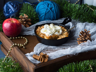 Apple crumble with cream as Christmas dessert
