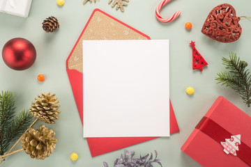 Fototapeta na wymiar Red envelope on christmas holiday background