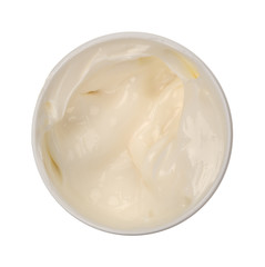 Container of cocoa butter cream skin lotion opened top view isolated on a white background.