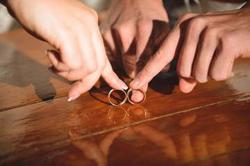 Obraz na płótnie Canvas Couple Playing with Rings