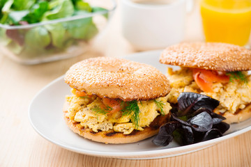 Breakfast sandwich on bagel with salmon,egg