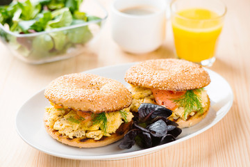Breakfast sandwich on bagel with salmon,egg