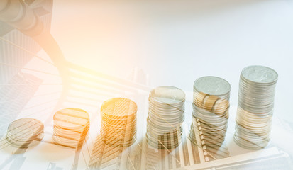 Double exposure of coins and modern city background, Finance and banking concept - 128613293