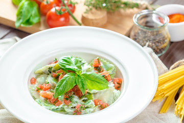 Ravioli pasta from green dough stuffing