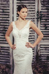 Young bride posing in wedding dress