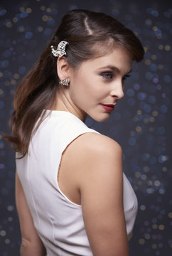 Elegant woman with silver jewelery