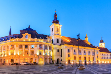Fototapeta na wymiar Sibiu, Romania. Large Square and City Hall. Transylvania medieval city.