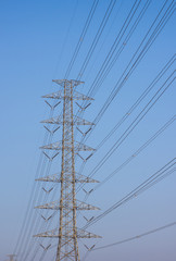 High voltage electric tower. over blue sky.