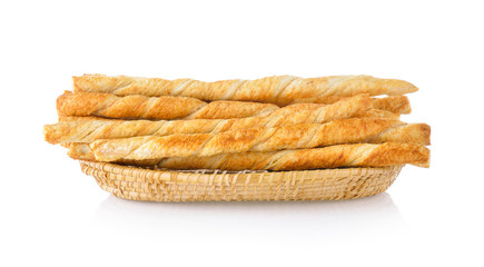 bread sticks in basket isolated on white background