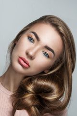 Fototapeta premium Portrait of beautiful sensual girl with beautiful hair