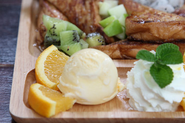 Honey toast : French toast , fresh fruit and ice cream with caramel sauce.
