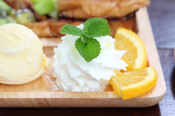 Honey toast : French toast , fresh fruit and ice cream with caramel sauce.