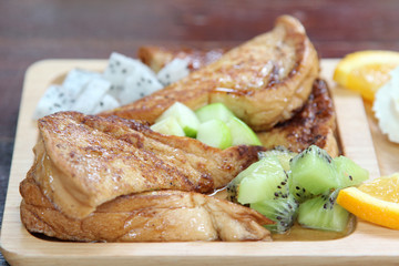 Honey toast : French toast , fresh fruit and ice cream with caramel sauce.