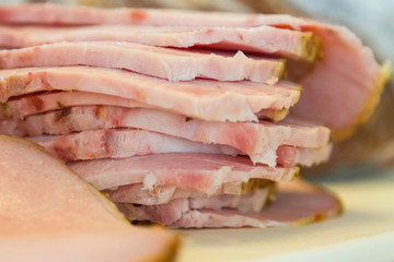 Sliced ham on a board