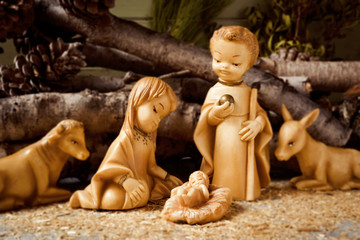 Fototapeta na wymiar the holy family in a rustic nativity scene