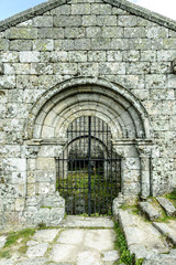 entry in ruins to the Romanesque church in the town of Monsanto, Portugal