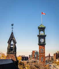 Church and Clocktower with Canadian Flag - Toronto, Ontario, Canada © diegograndi