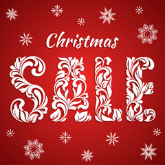Christmas sale. The Text from a floral ornament on a red background